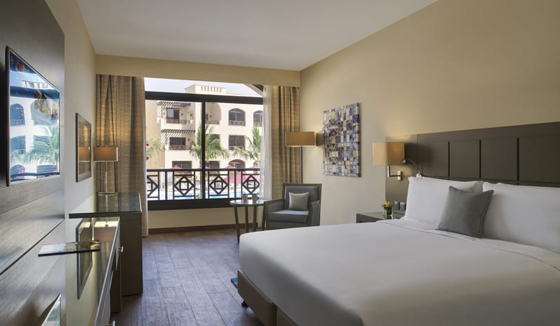 middle-east-holidays-ras-al-khaimah-the-cove-rotana-resort-pool-view- room